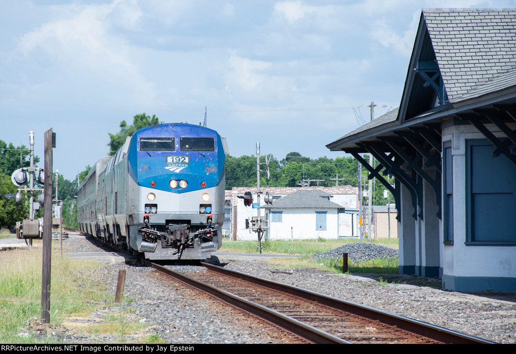 The westbound Sunset Limited approaches the old Liberty Depot 